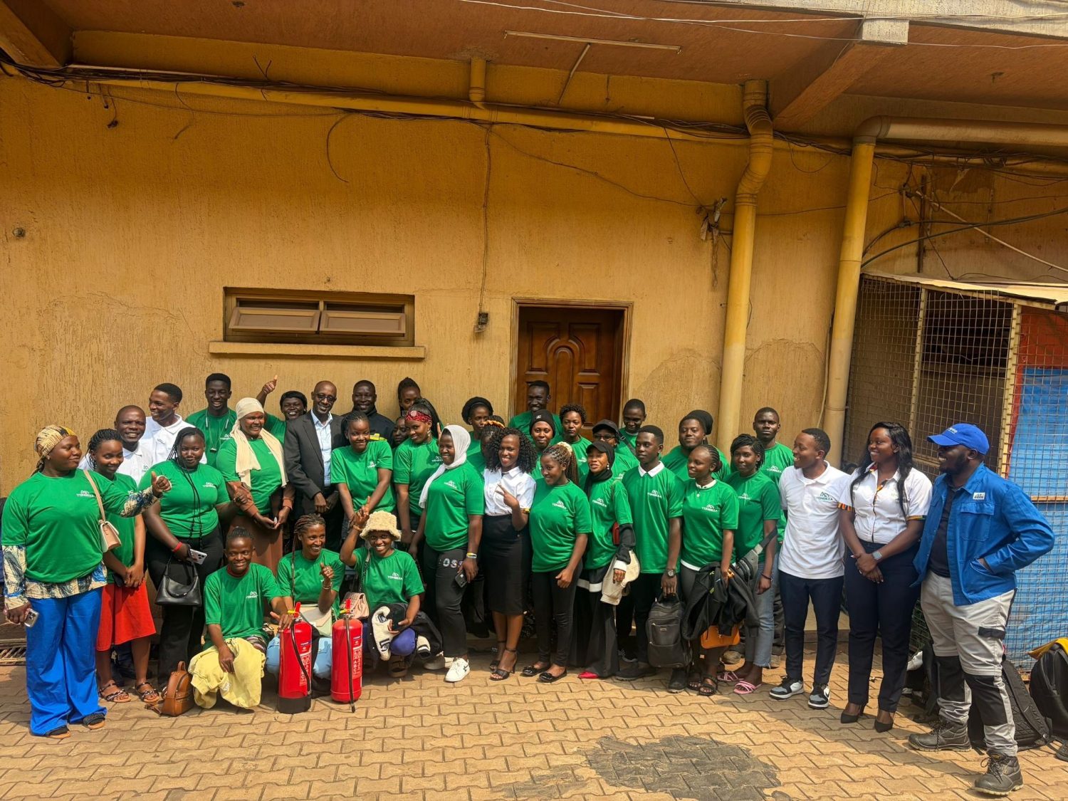 Yongeza station attendants and trainees at a women's training session in Uganda
